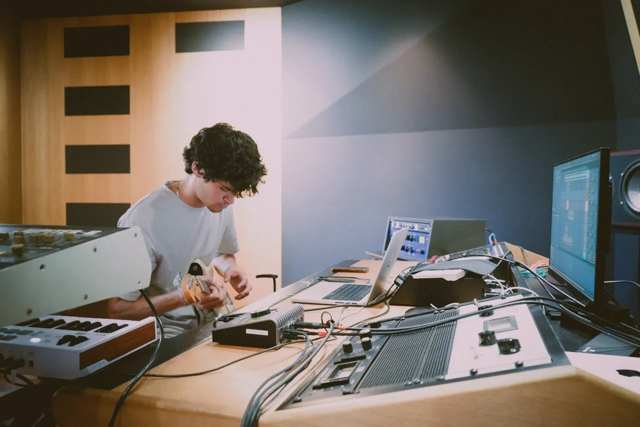 A producer working in a Memento studio